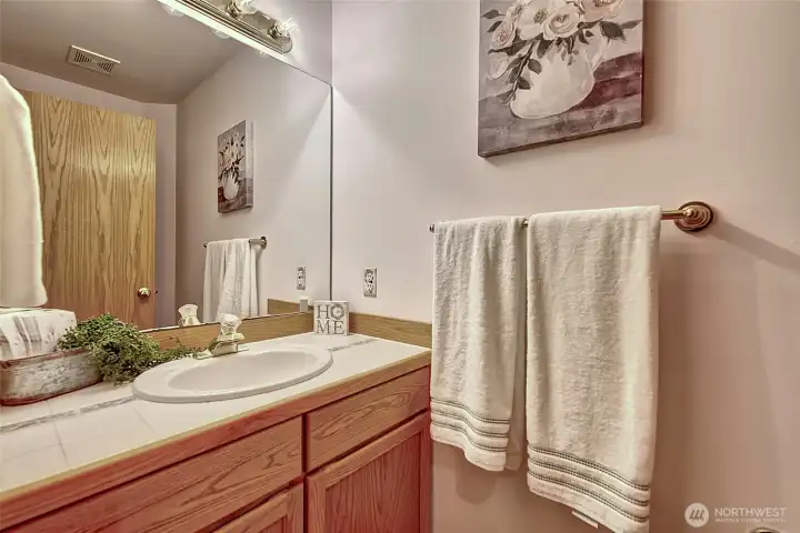 Half bath conveniently located on the first floor for guests.