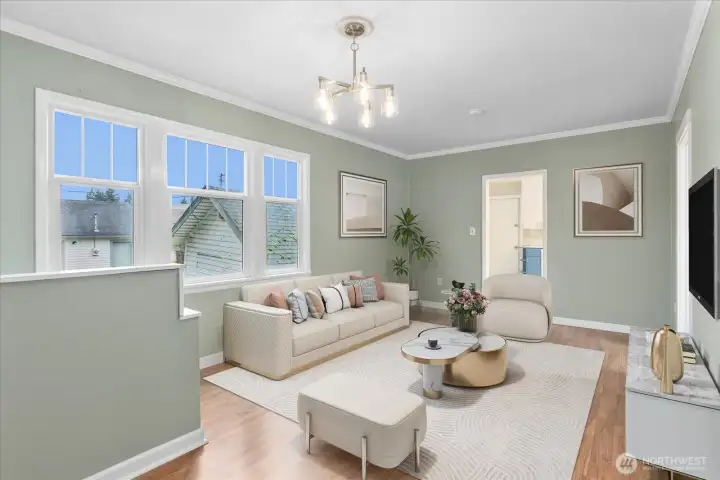 Virtually staged living room upon entry of home.