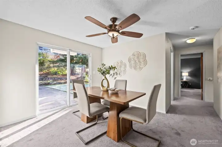 Dining room. View from living room. Down the hall is 3 bedrooms and full bath.