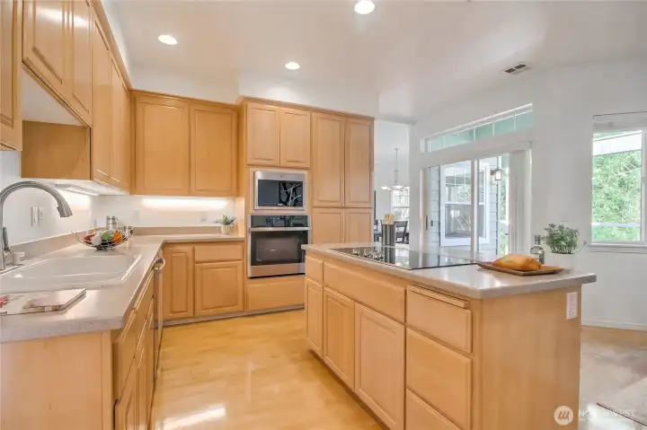Beautifully maintained kitchen flooded with natural light. Great cabinet space. New SS appliances (refrigerator 2018).