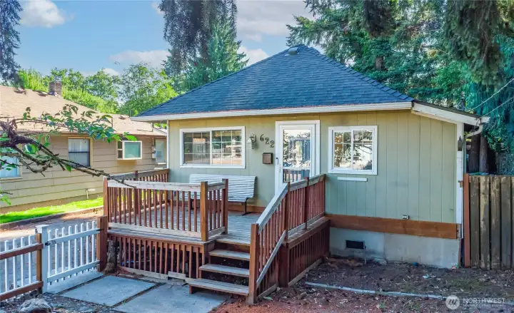 Large front deck offers the perfect spot to relax, entertain, and enjoy the outdoors.