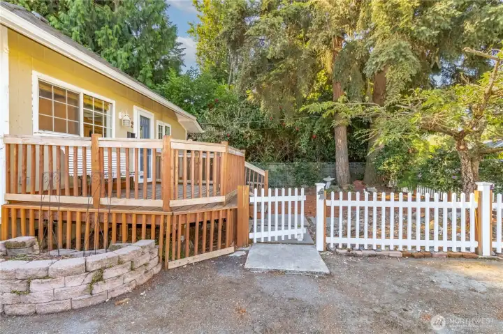Classic white picket fence curb appeal.