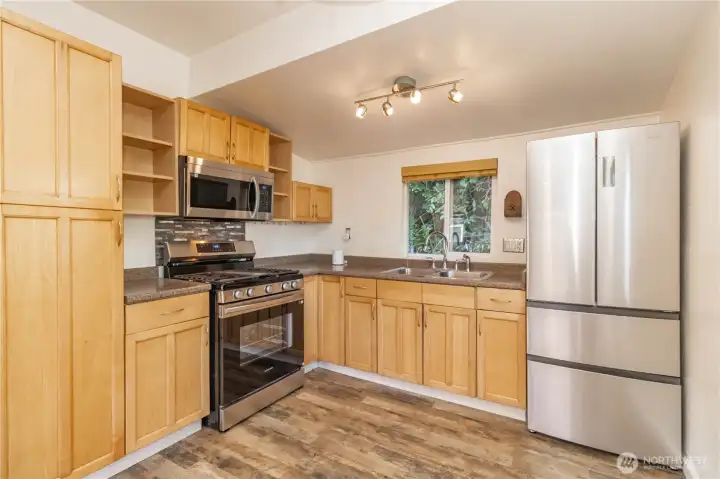 Stunning cabinetry enhances the kitchen’s overall appeal.