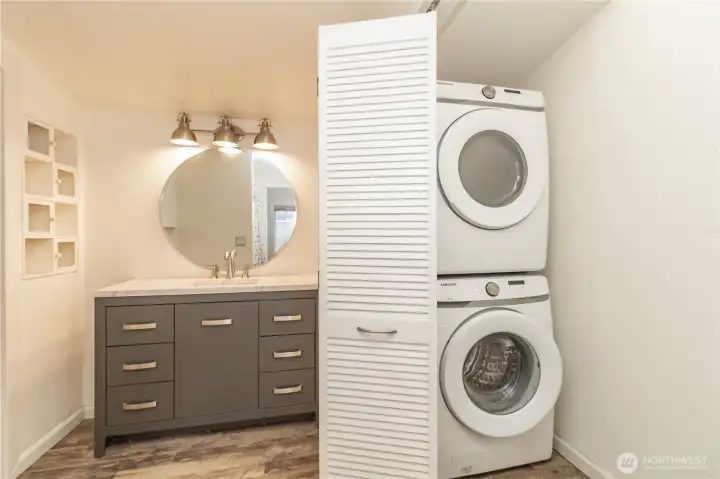 Main full bath includes a conveniently located utility closet.