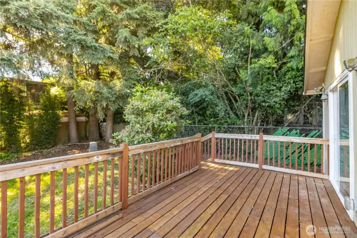 Secluded back deck provides a peaceful private retreat.