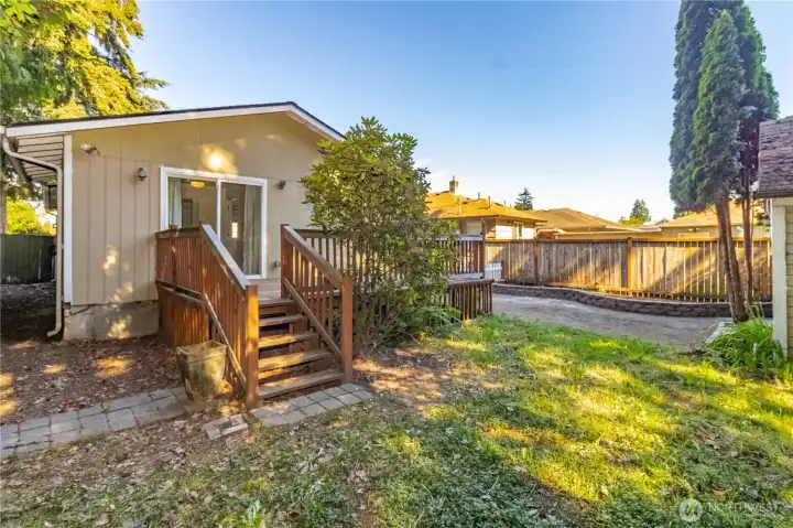 Step down into the private backyard with easy access to the studio.