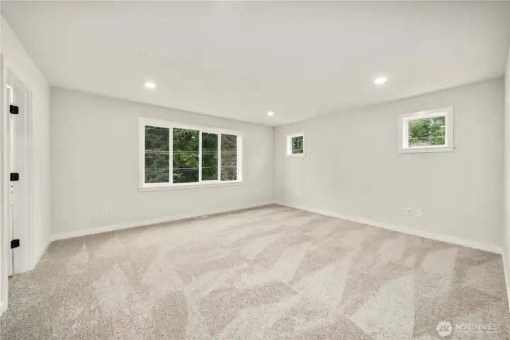 Primary bedroom. Photos of a previously completed home. Actual colors and finishes may vary. See site agent for details.