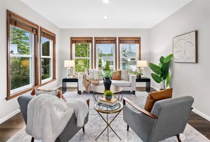 One of the 2 living rooms in house allows for a well lit entertaining space.