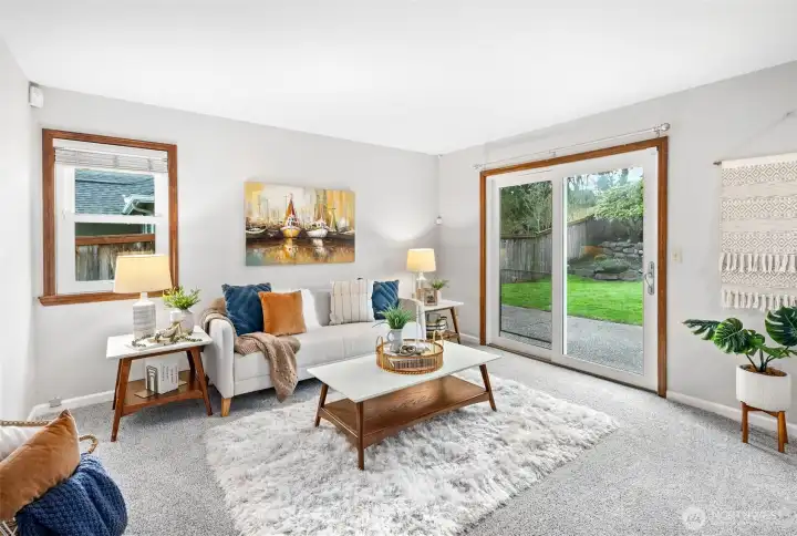 2nd living room has slider which gives access to private/spacious back yard.