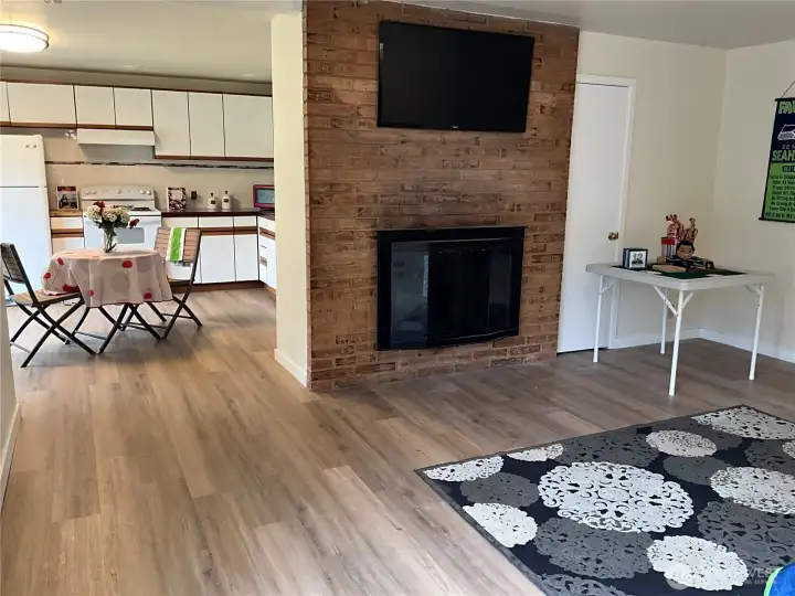 Unit 2 fireplace, view from living room.