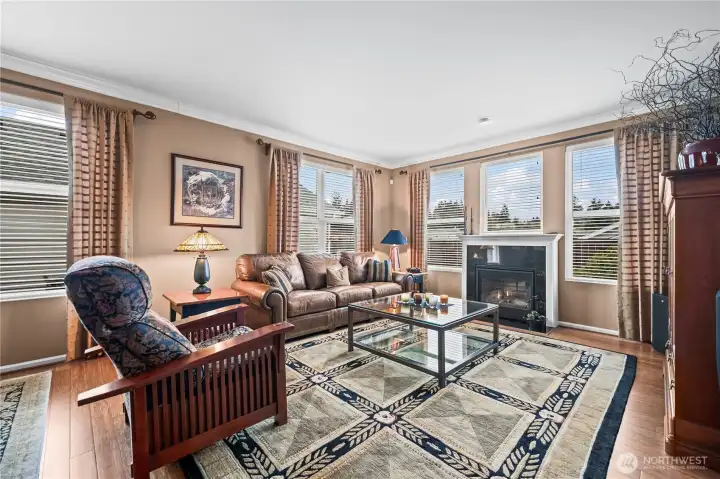 The gracious living room offers the perfect blend of elegance and comfort.