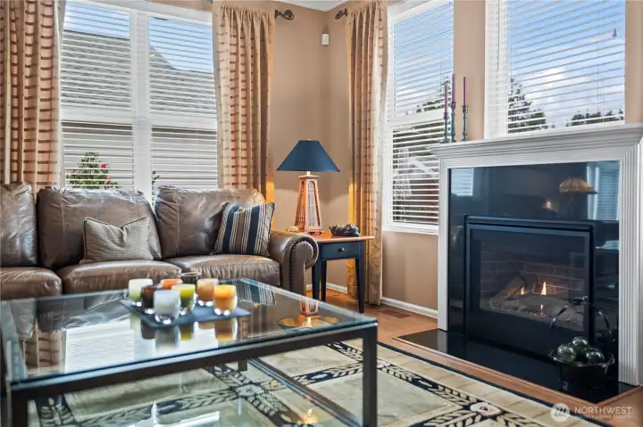 This elegant black granite gas fireplace serves as the living room’s focal point.
