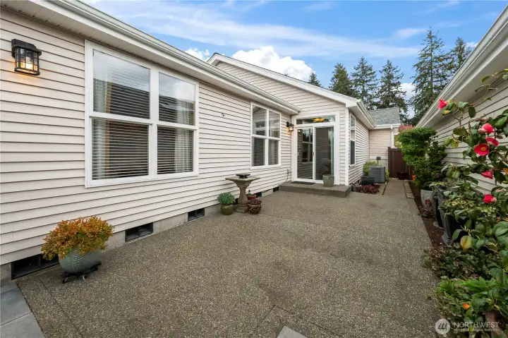 Tranquil fountain creates a peaceful, Zen-like outdoor ambiance.