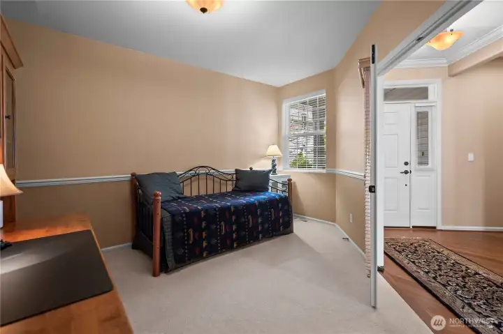 Den or office just off the entry—ideal flex space or potential third bedroom.