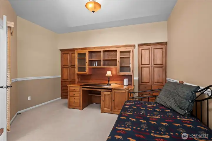 Custom-built desk creates a functional and stylish workspace.