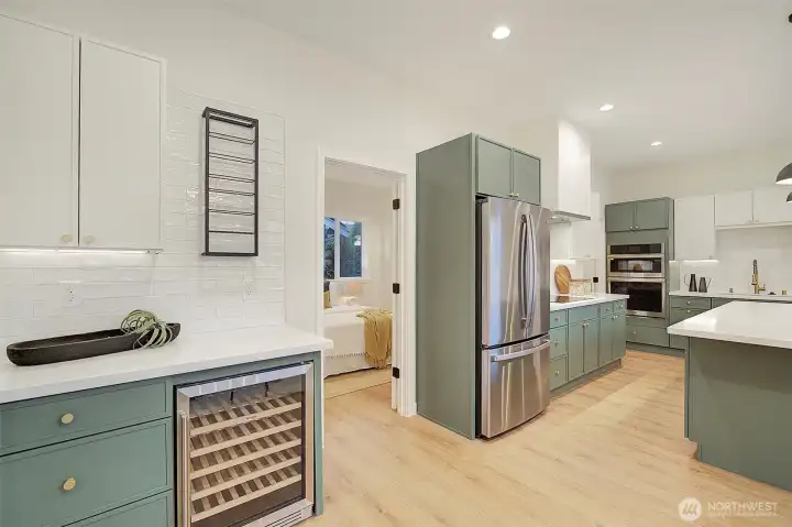 Additional kitchen storage and a wine fridge!