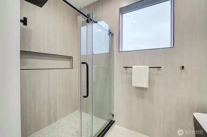 huge walk in shower in the primary bathroom
