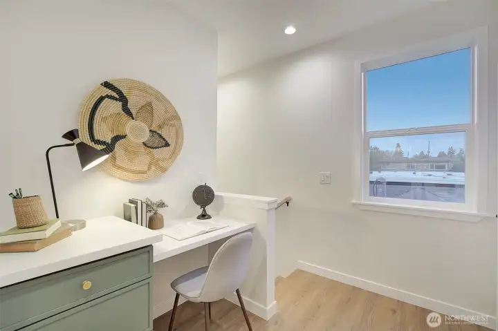 extra storage or workspace on the upper level landing.