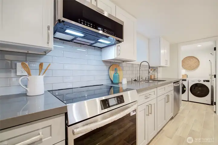 Downstairs ADU includes a pricate entrance, large kitchen and a second washer/dryer