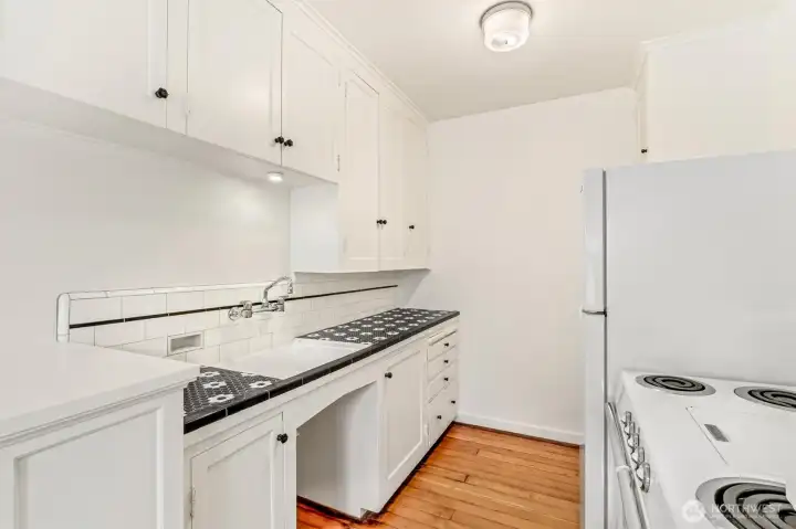 Look at those gorgeous, new counters! Lots of cabinet space too! Look at those gorgeous, new counters! Lots of cabinet space too!