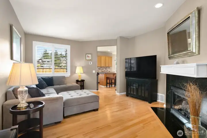 Wood flooring throughout main level.