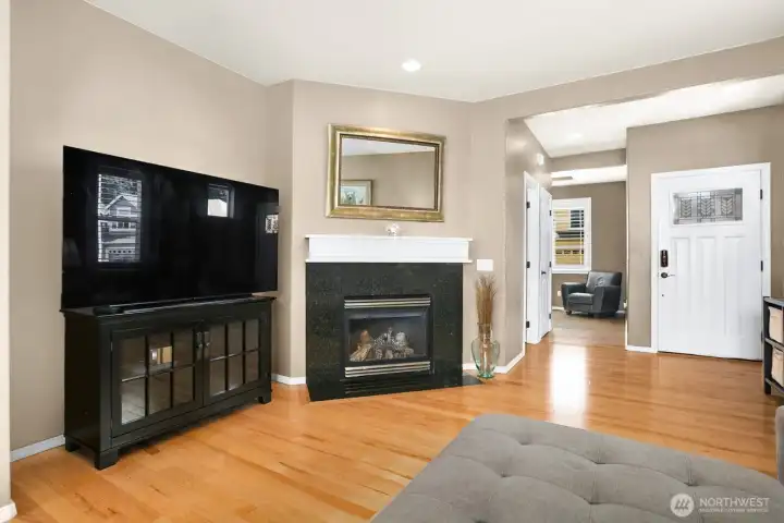 Living room with gas fireplace.