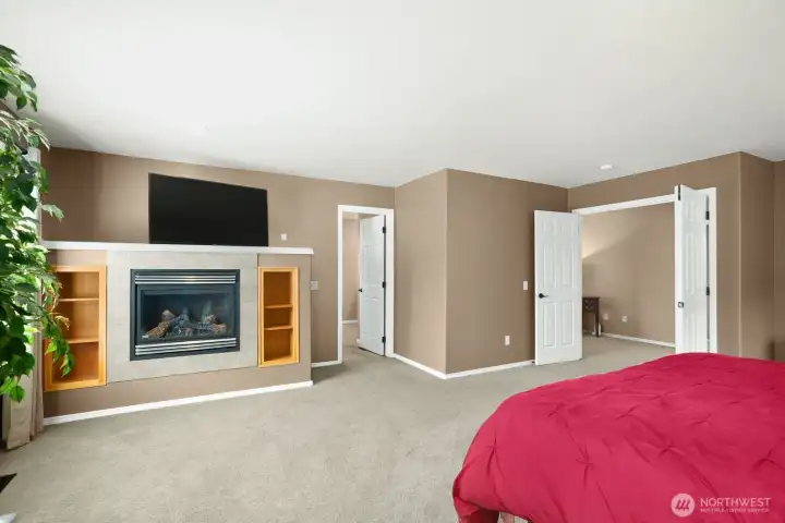 Primary bedroom with gas fireplace.