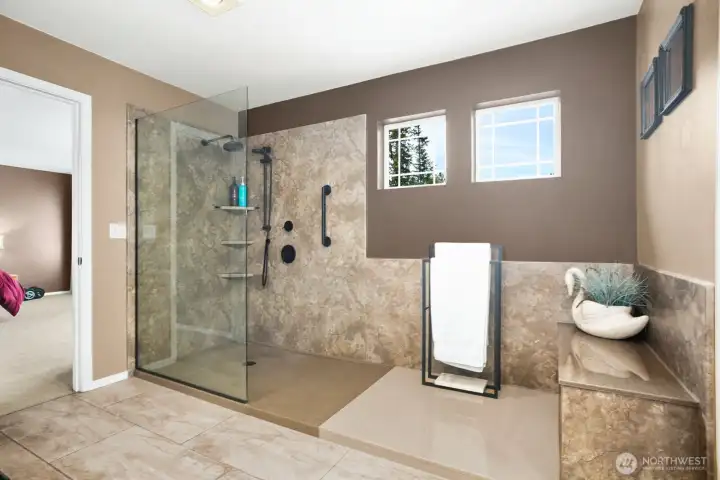 Remodeled primary bathroom with radiant heated floors.
