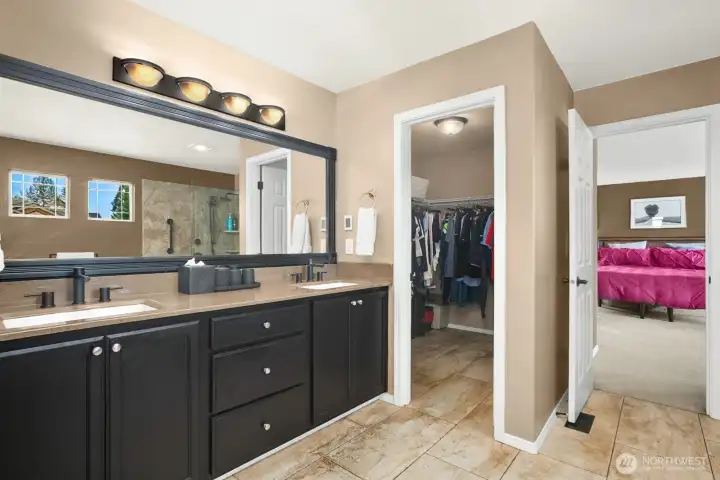 Double vanity and roomy walk-in closet.