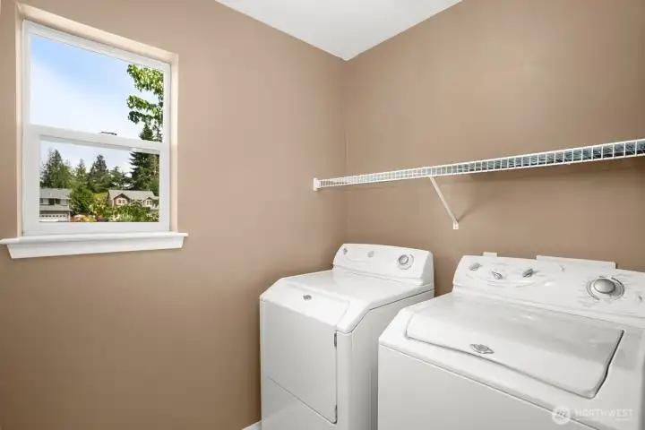 Convenient upper level laundry room.