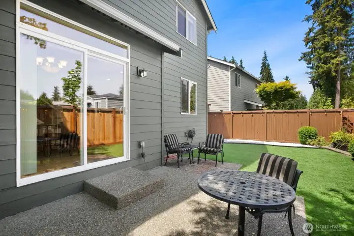 Good sized backyard with afternoon shade tree and lawn that is always green.
