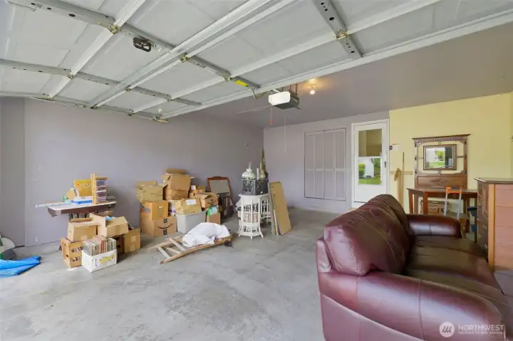 Attached 2-car garage with automatic opener and interior access.