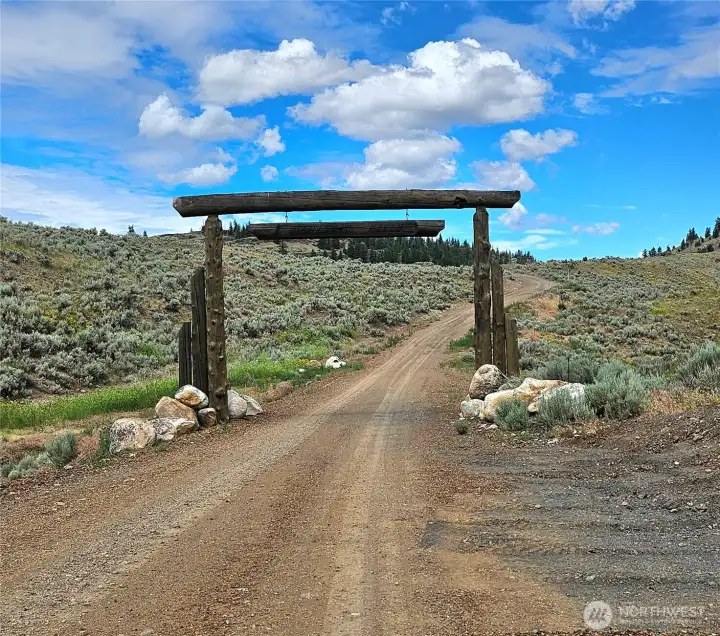 Go through here until you see a green gate on the left