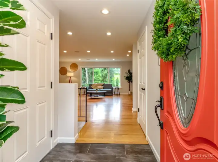 This red door is just the beginning — buyers will love the welcoming feel of this Twin Lakes home.