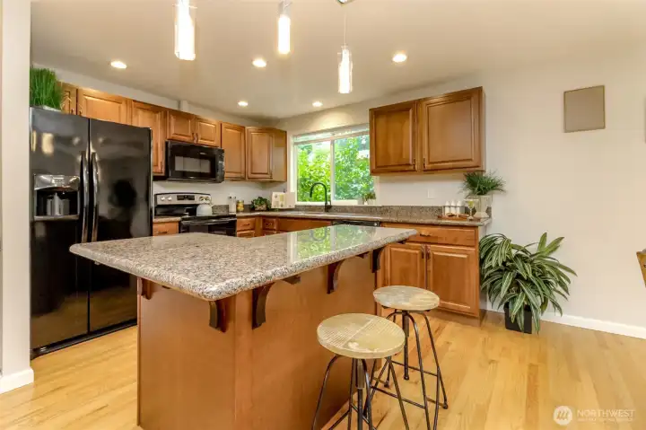 A kitchen you will love with beautiful counters and plenty of cabinet space.