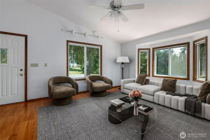 Living room with laminate floors virtually staged