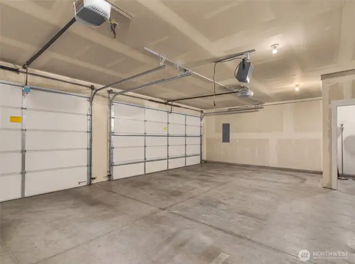 three car garage with extra finished room