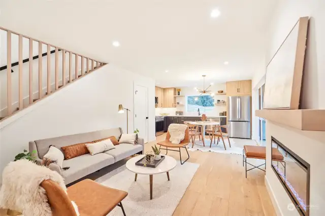 Modern elements throughout the home  including plank hardwoods, white oak fireplace mantel and tons of natural light.