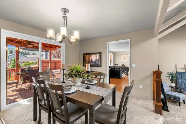Dining room with sliding door access to covered back deck.