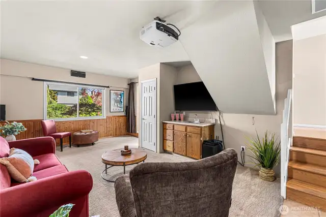 Lower level entertainment area with movie projector included.