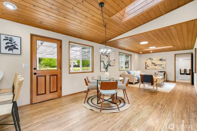 Dining area sits adjacent to kitchen and opens to family room.