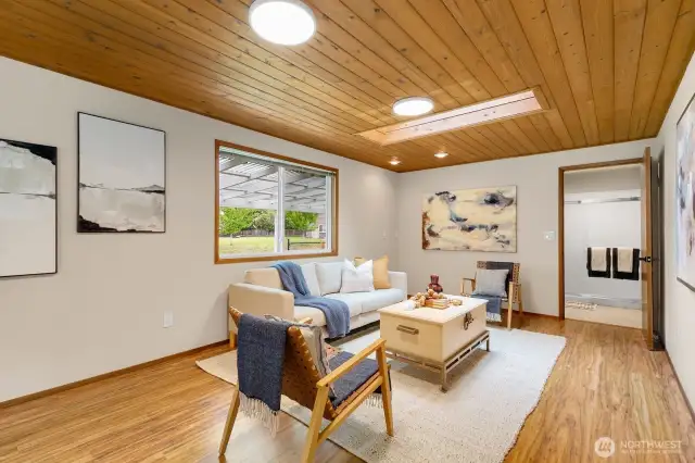 Family room / bonus area sits off laundry & 3/4 bath - also entrance to garage.