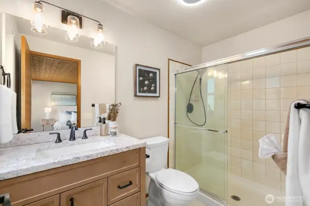 Updated primary ensuite offers brand new vanity.