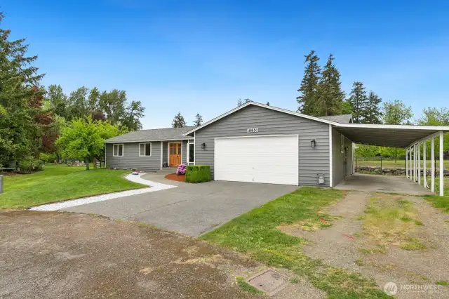 Attached two-car garage plus parking for additional cars, boat, RV, etc.