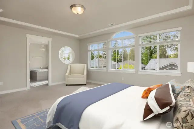Primary Bedroom w Walls of Windows & Ensuite to Full Bathroom