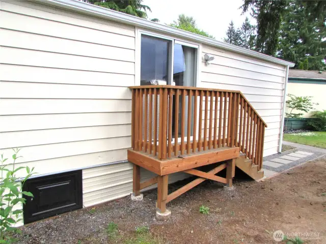 ALL NEW BACK PORCH W/ TREX DECKING & WALKWAY AND GUTTERS.
