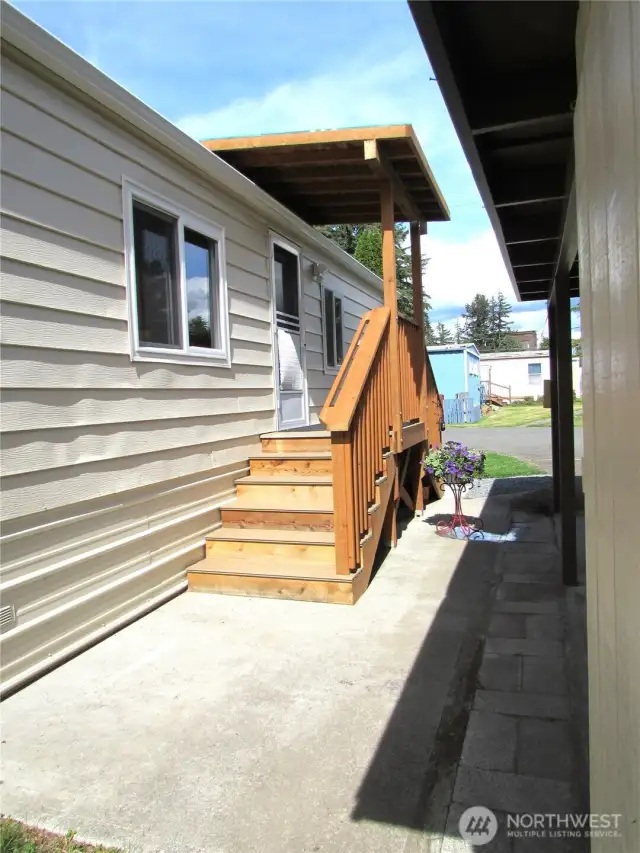 COMING FROM BACK YARD AREA TO FRONT DECK.