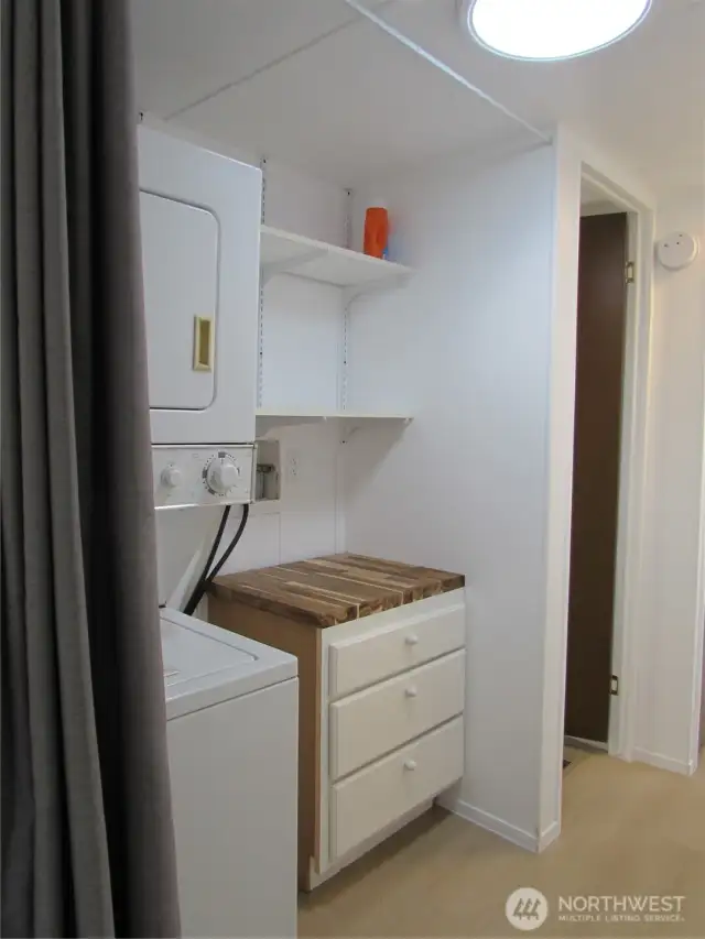 LAUNDRY AREA ON LEFT.