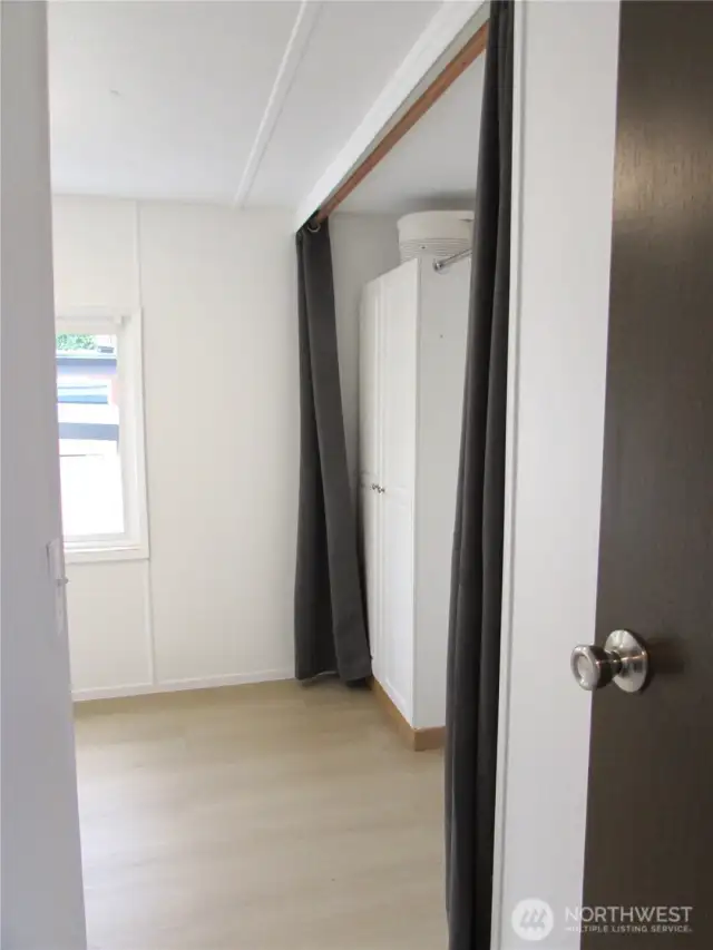 SPARE BEDROOM WITH BUILT-IN STORAGE.