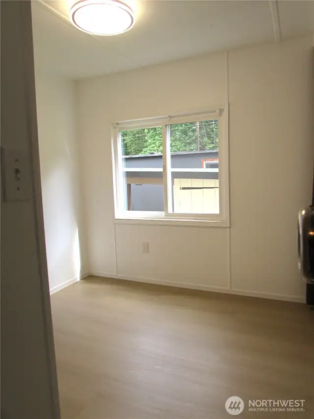 SPARE BEDROOM WINDOW FACES SOUTH & OVER LOOKS CARPORT & BACKYARD.